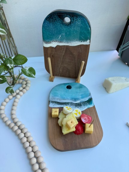 Affordable 5x8 walnut mini board with resin wave design, ideal as a spoon rest, snack plate, or budget-friendly gift for apartment and RV dwellers.
