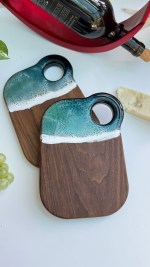 Handcrafted 5x8 walnut mini cheese board with ocean resin wave design, customizable with engraving, eco-friendly, and gift-wrapped by TalkingThyme.